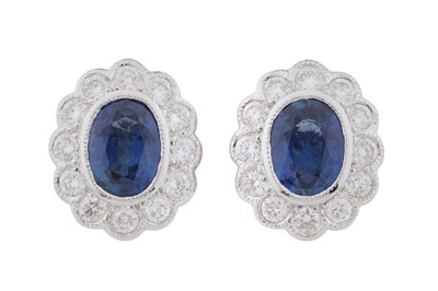 Lot 70 - A pair of sapphire and diamond stud earrings