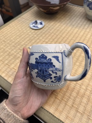 Lot 5 - A Chinese blue and white teapot and cover, Qing dynasty, Kangxi period