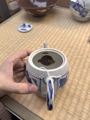 Lot 5 - A Chinese blue and white teapot and cover, Qing dynasty, Kangxi period
