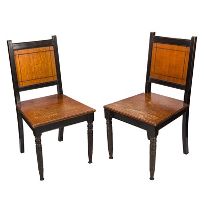 Lot 330 - A pair of ebonised oak hall chairs