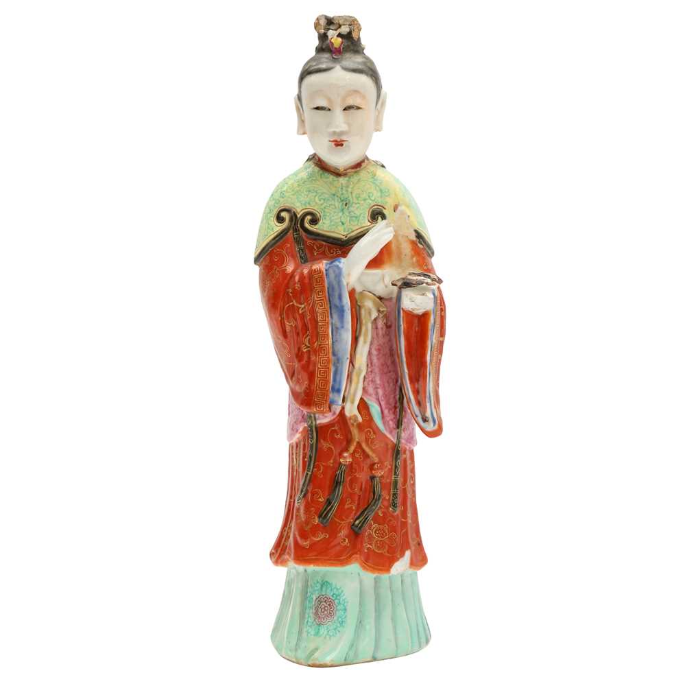 Lot 73 - A rare Chinese famille-rose 'Court Lady' candle holder, Qing dynasty, Qianlong period