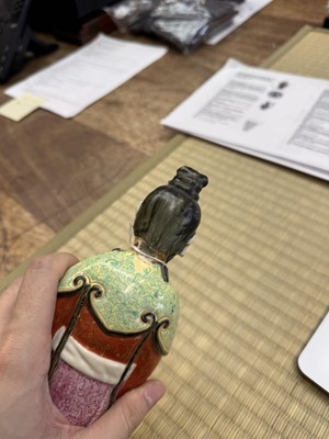 Lot 73 - A rare Chinese famille-rose 'Court Lady' candle holder, Qing dynasty, Qianlong period