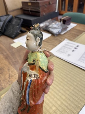 Lot 73 - A rare Chinese famille-rose 'Court Lady' candle holder, Qing dynasty, Qianlong period