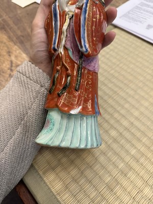 Lot 73 - A rare Chinese famille-rose 'Court Lady' candle holder, Qing dynasty, Qianlong period