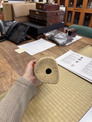 Lot 73 - A rare Chinese famille-rose 'Court Lady' candle holder, Qing dynasty, Qianlong period