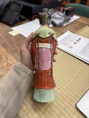 Lot 73 - A rare Chinese famille-rose 'Court Lady' candle holder, Qing dynasty, Qianlong period