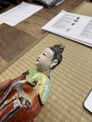 Lot 73 - A rare Chinese famille-rose 'Court Lady' candle holder, Qing dynasty, Qianlong period