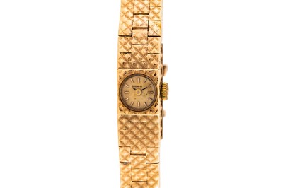 Lot 447 - Lady's Bueche-Girod 9k Gold Bracelet Watch