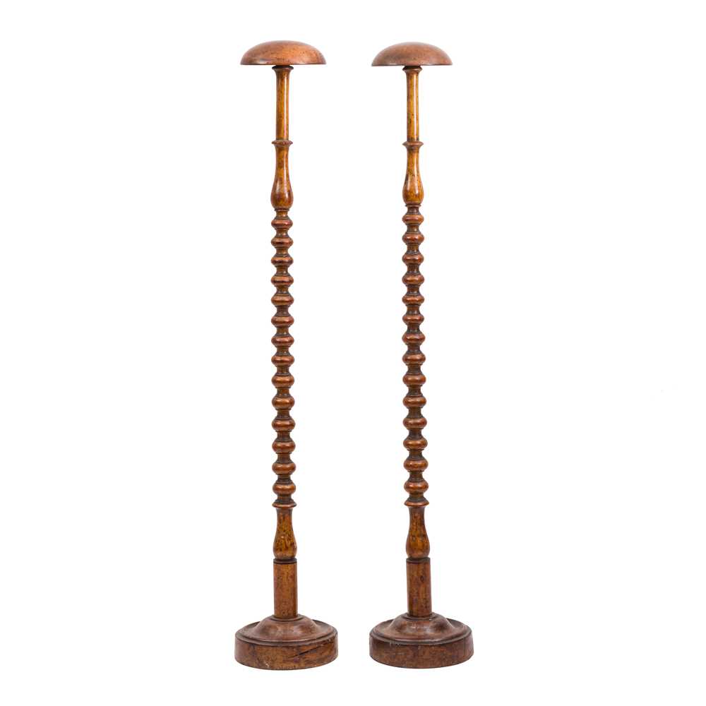 Lot 455 - A pair of Victorian walnut wig stands