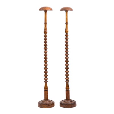 Lot 455 - A pair of Victorian walnut wig stands