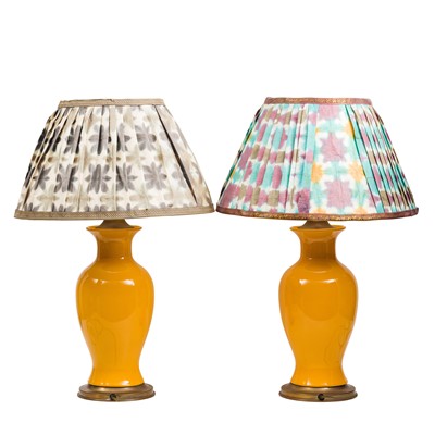 Lot 265 - A pair of yellow monochrome ceramic vase lamps