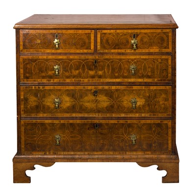 Lot 128 - A William & Mary walnut and olivewood oyster veneered chest of drawers, circa 1690
