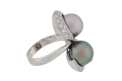 Lot 182 - A pearl and diamond crossover ring