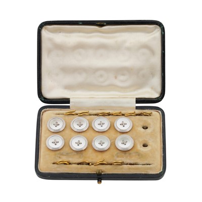 Lot 410 - A set of mother of pearl dress studs