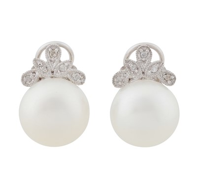 Lot 372 - A pair of pearl and diamond stud earrings