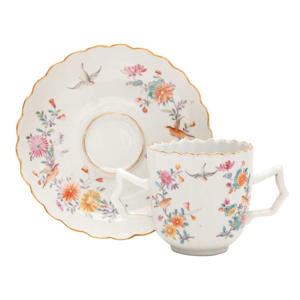 Lot 495 - A Chinese export famille-rose chocolate cup and saucer, Qing dynasty, 19th century