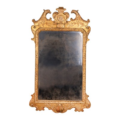 Lot 140 - A George I giltwood and gesso wall mirror