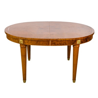 Lot 346 - A French Empire style dining table