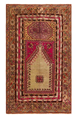 Lot 65 - An antique Ghiordes prayer rug, Turkey, approx: 193cm. x 114cm