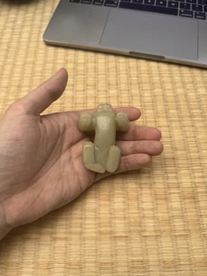 Lot 85 - A Chinese celadon jade carving of a lion, Qing Dynasty, 18th/19th century