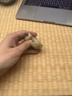 Lot 85 - A Chinese celadon jade carving of a lion, Qing Dynasty, 18th/19th century