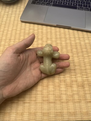 Lot 85 - A Chinese celadon jade carving of a lion, Qing Dynasty, 18th/19th century