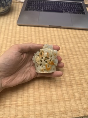 Lot 81 - A Chinese Yuan-style pale-celadon jade finial, 20th century