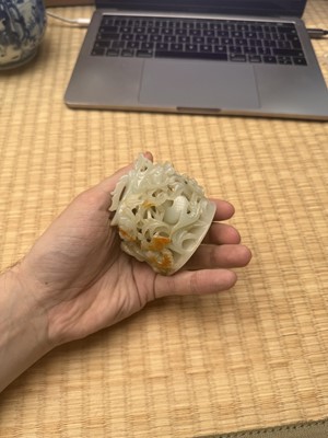 Lot 81 - A Chinese Yuan-style pale-celadon jade finial, 20th century