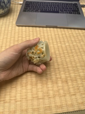 Lot 81 - A Chinese Yuan-style pale-celadon jade finial, 20th century