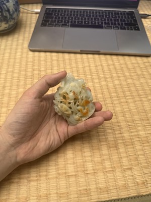 Lot 81 - A Chinese Yuan-style pale-celadon jade finial, 20th century