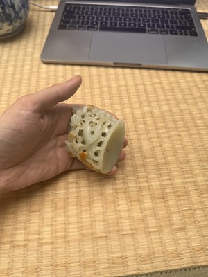 Lot 81 - A Chinese Yuan-style pale-celadon jade finial, 20th century