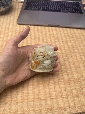 Lot 81 - A Chinese Yuan-style pale-celadon jade finial, 20th century