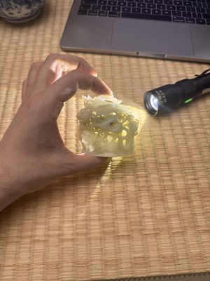 Lot 81 - A Chinese Yuan-style pale-celadon jade finial, 20th century