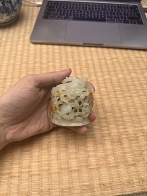 Lot 81 - A Chinese Yuan-style pale-celadon jade finial, 20th century