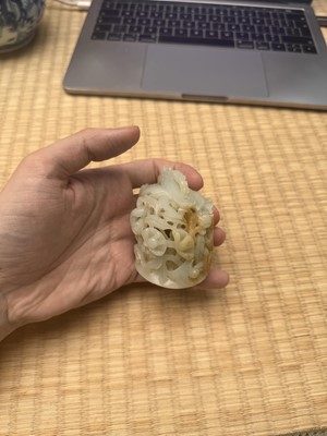 Lot 81 - A Chinese Yuan-style pale-celadon jade finial, 20th century