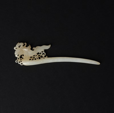 Lot 106 - A Chinese white jade 'phoenix' hairpin, 20th century
