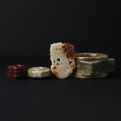 Lot 150 - Four Chinese archaistic jade carvings, 20th century
