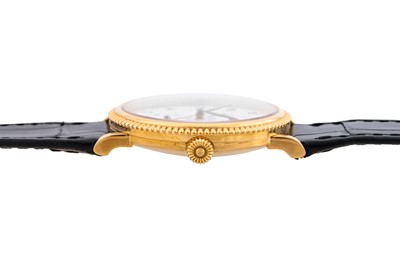 Lot 412 - Patek Philippe - 18k Gold Dual Time Wristwatch