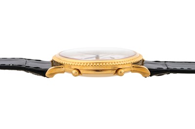 Lot 412 - Patek Philippe - 18k Gold Dual Time Wristwatch