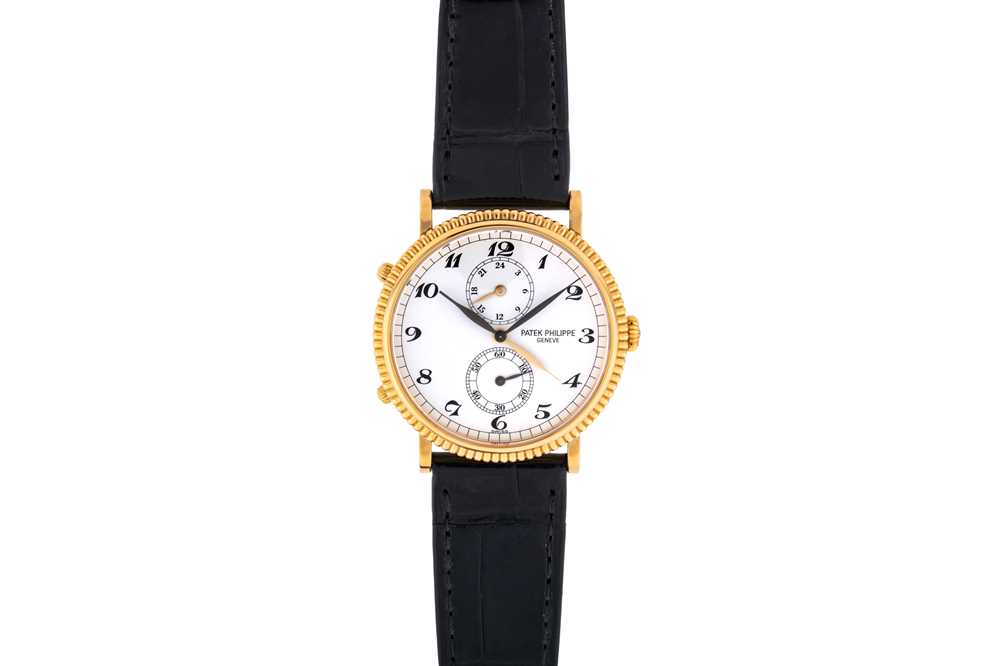 Lot 412 - Patek Philippe - 18k Gold Dual Time Wristwatch
