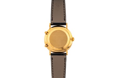 Lot 412 - Patek Philippe - 18k Gold Dual Time Wristwatch