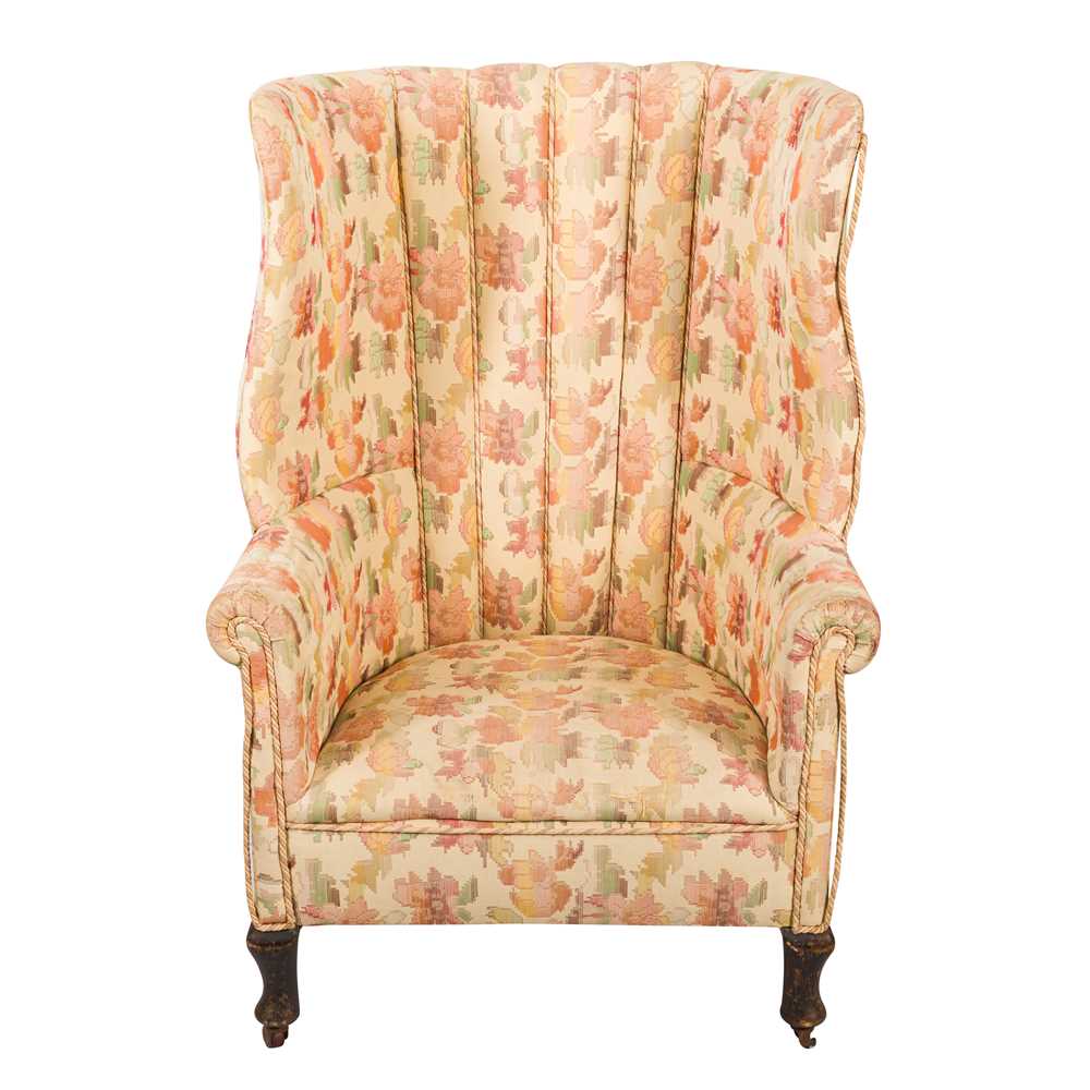 Lot 62 - An early 20th century barrel back armchair