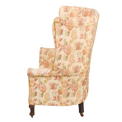 Lot 62 - An early 20th century barrel back armchair