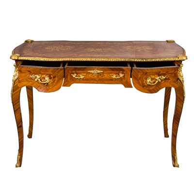 Lot 341 - A Louis XV style kingwood and marquetry bureau plat