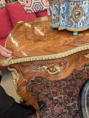 Lot 341 - A Louis XV style kingwood and marquetry bureau plat