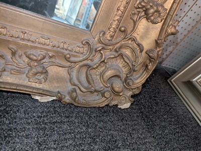 Lot 76 - A Victorian gilt wood and gesso framed mirror