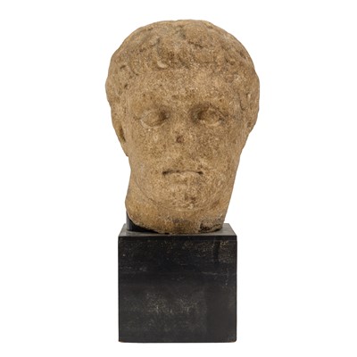 Lot 72 - An over life-size marble male head, possibly Roman, circa 1st Century B.C./A.D.