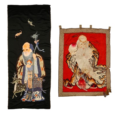 Lot 555 - Two Chinese silk embroidered 'Shou Lao' panels, 19th / 20th century
