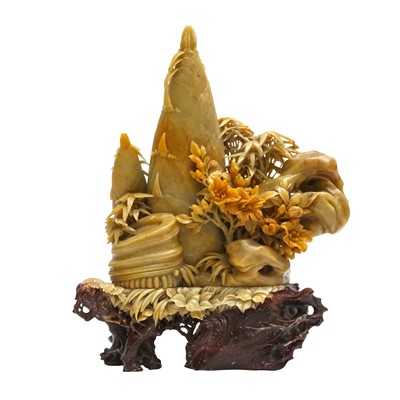Lot 570 - A Chinese carved soapstone 'bamboo shoot' group, 20th century