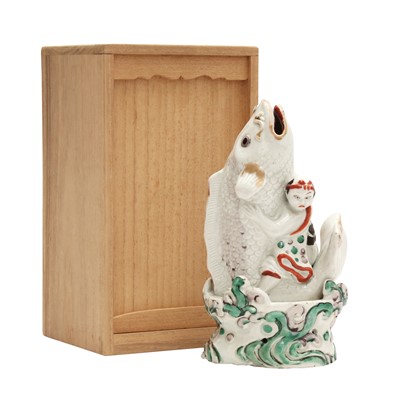 Lot 13 - A Japanese Imari 'boy and carp' figure, Edo period, 18th century